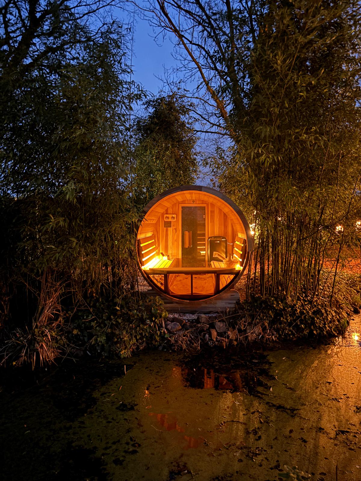 Japandi Lounge sauna in garden at dusk